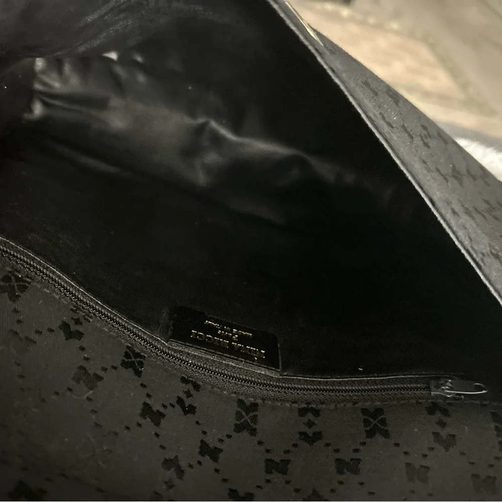 Nina Ricci Signature Clutch EUC (no call outs)
